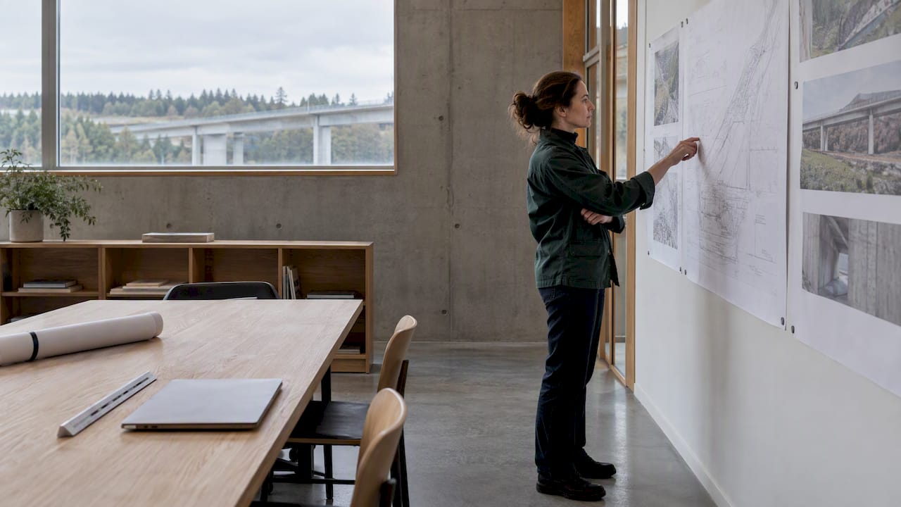 Civil engineer reviewing an AI-assisted design