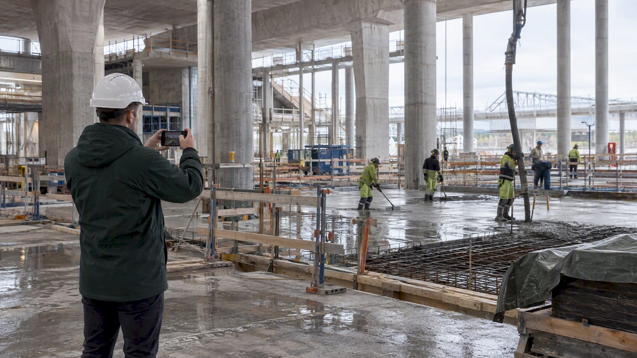 Superintendent documenting construction work on site